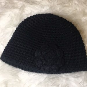 Black Crochet Hat With Flower Embellishment